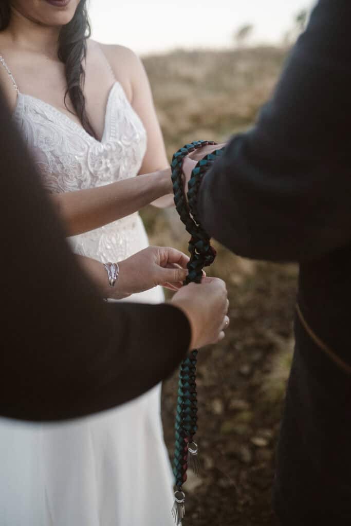 A handfasting ceremony with bride and groom. 