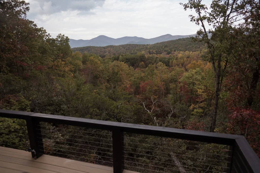 A view of the mountains of North Georgia on a porch of a cabin. 